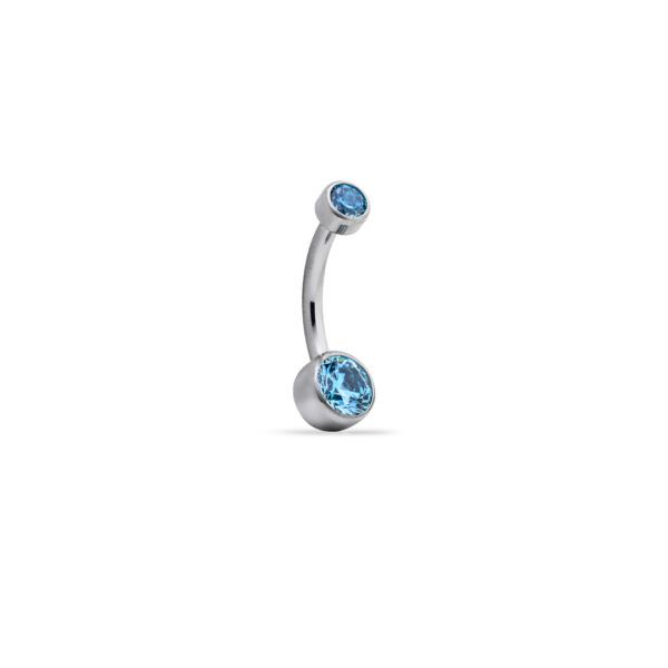 Piercing ombligo con gema azul